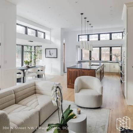 Open-concept living, dining, and kitchen area