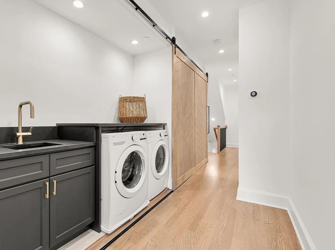 Laundry room with barn door